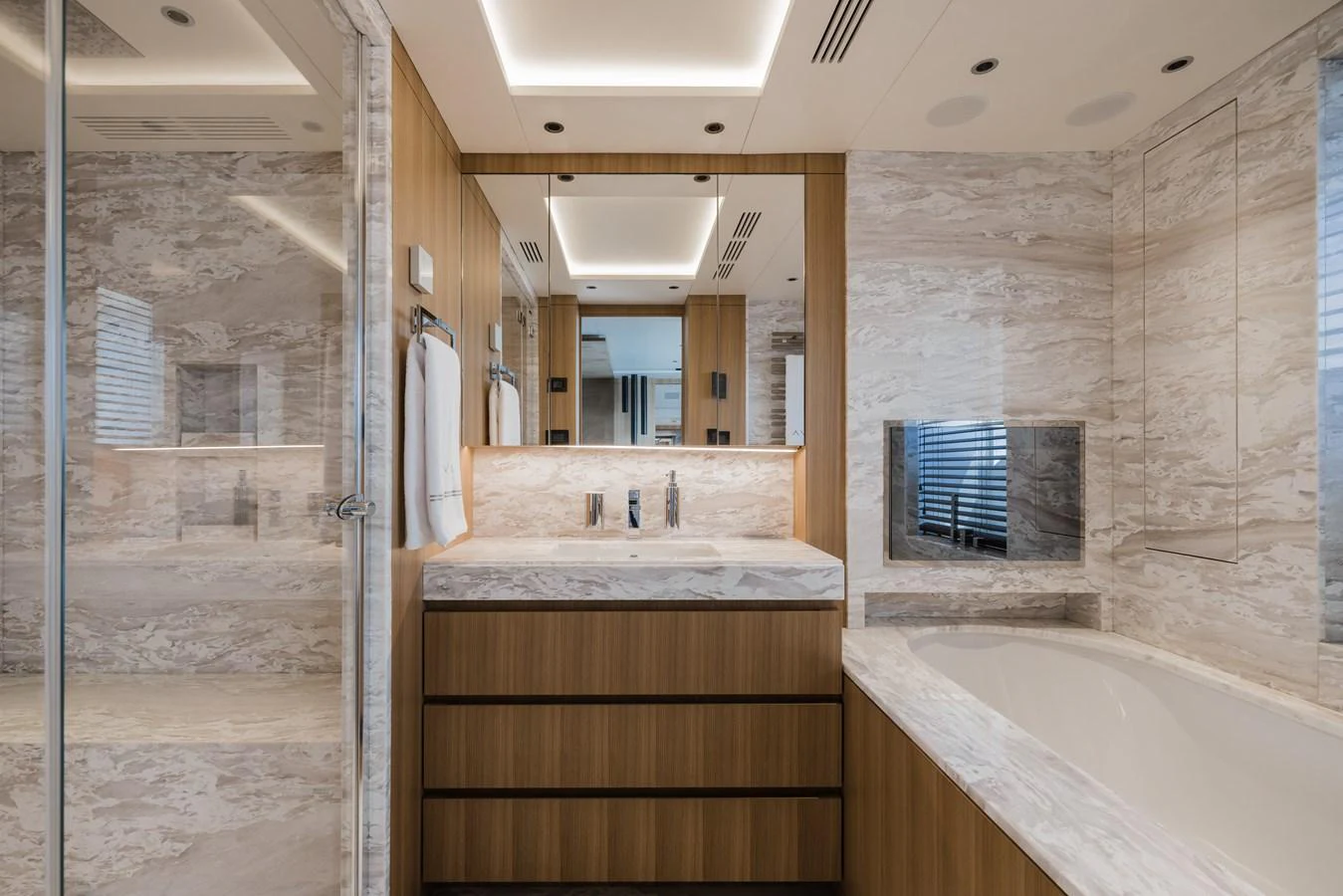 The yacht's bathroom features luxurious marble surfaces and modern fixtures. aboard ADVA Yacht for Sale