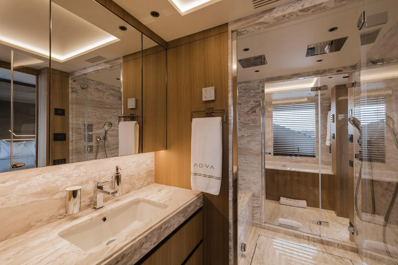 The yacht's bathroom features luxurious marble surfaces and modern fixtures. aboard ADVA Yacht for Sale
