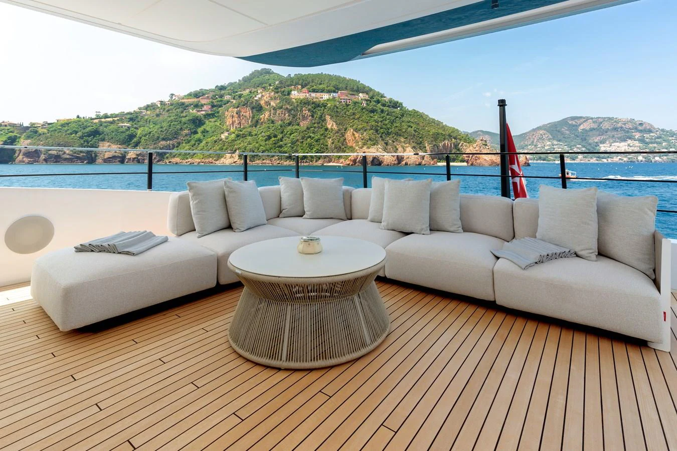 The aft deck features a spacious and comfortable seating area with stunning views of the surrounding landscape. aboard LADY DIA Yacht for Sale