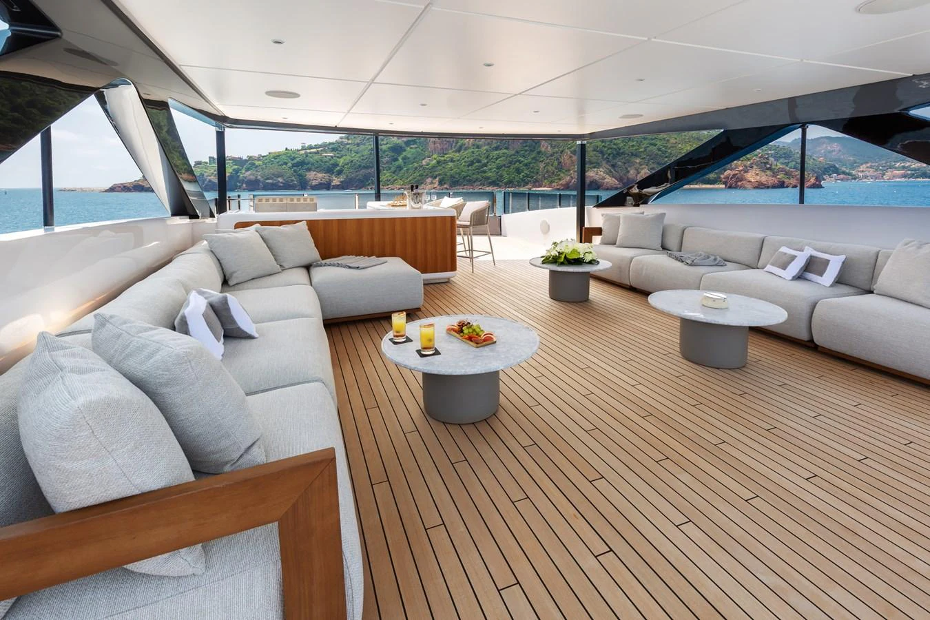 The spacious flybridge features comfortable seating and stunning views. aboard LADY DIA Yacht for Sale