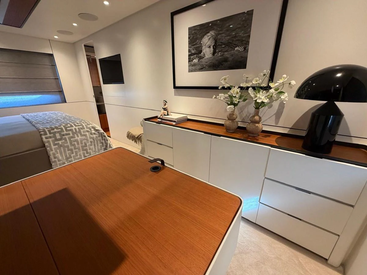 The stateroom features elegant decor with a blend of modern and classic elements. aboard OUT OF THE BLUE Yacht for Sale
