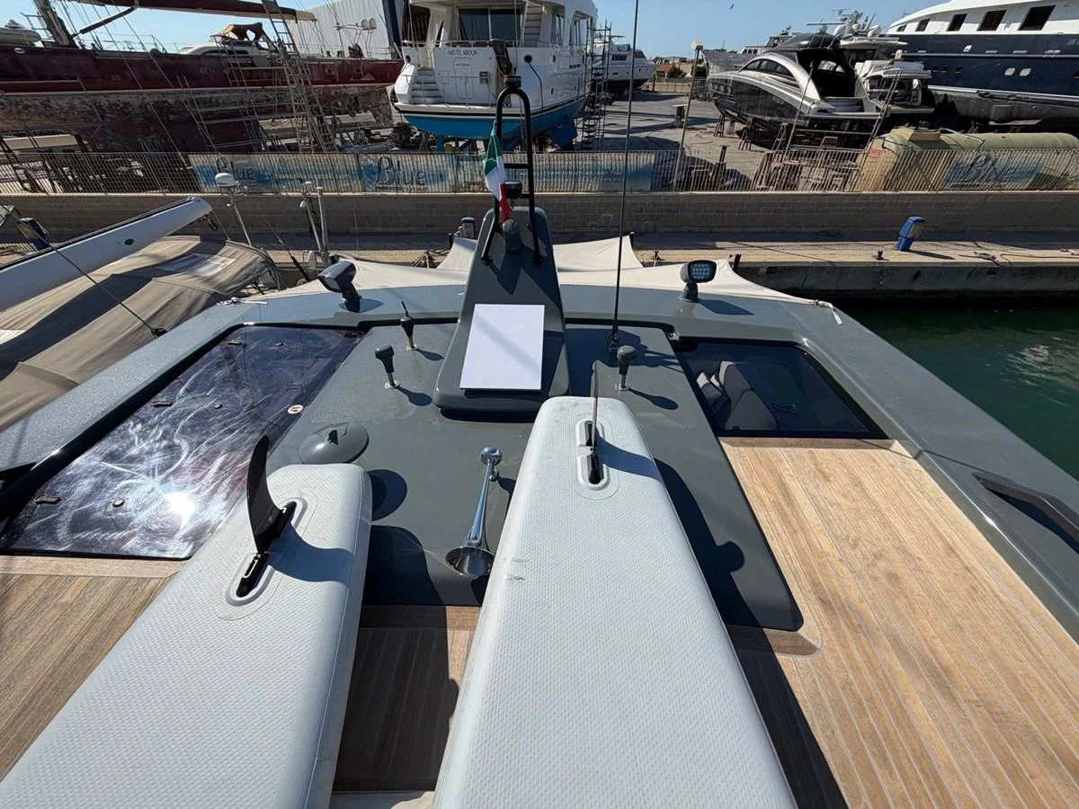 The yacht's deck is equipped with sleek, modern fittings and ample space for relaxation. aboard OUT OF THE BLUE Yacht for Sale