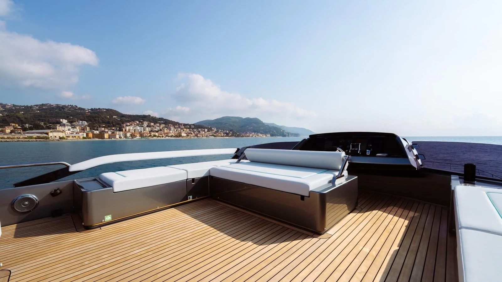 The yacht's sundeck offers a spacious and inviting area for relaxation with stunning views of the coastline. aboard MAYAR Yacht for Sale