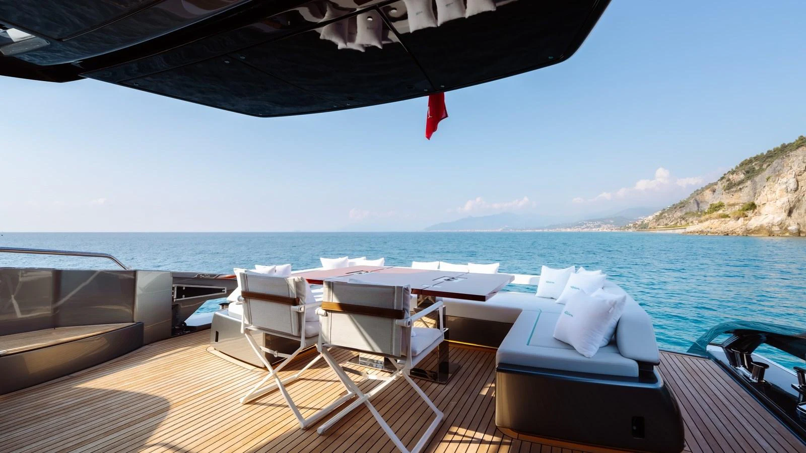 The yacht's aft deck offers a spacious and inviting area for relaxation with stunning ocean views. aboard MAYAR Yacht for Sale