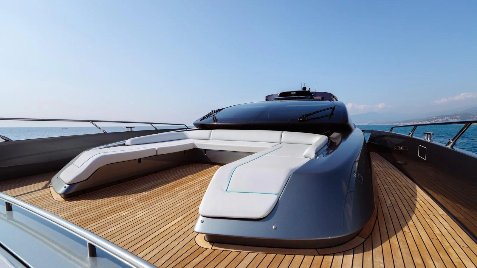 The yacht's foredeck features sleek, modern seating with a stunning view of the open sea. aboard MAYAR Yacht for Sale
