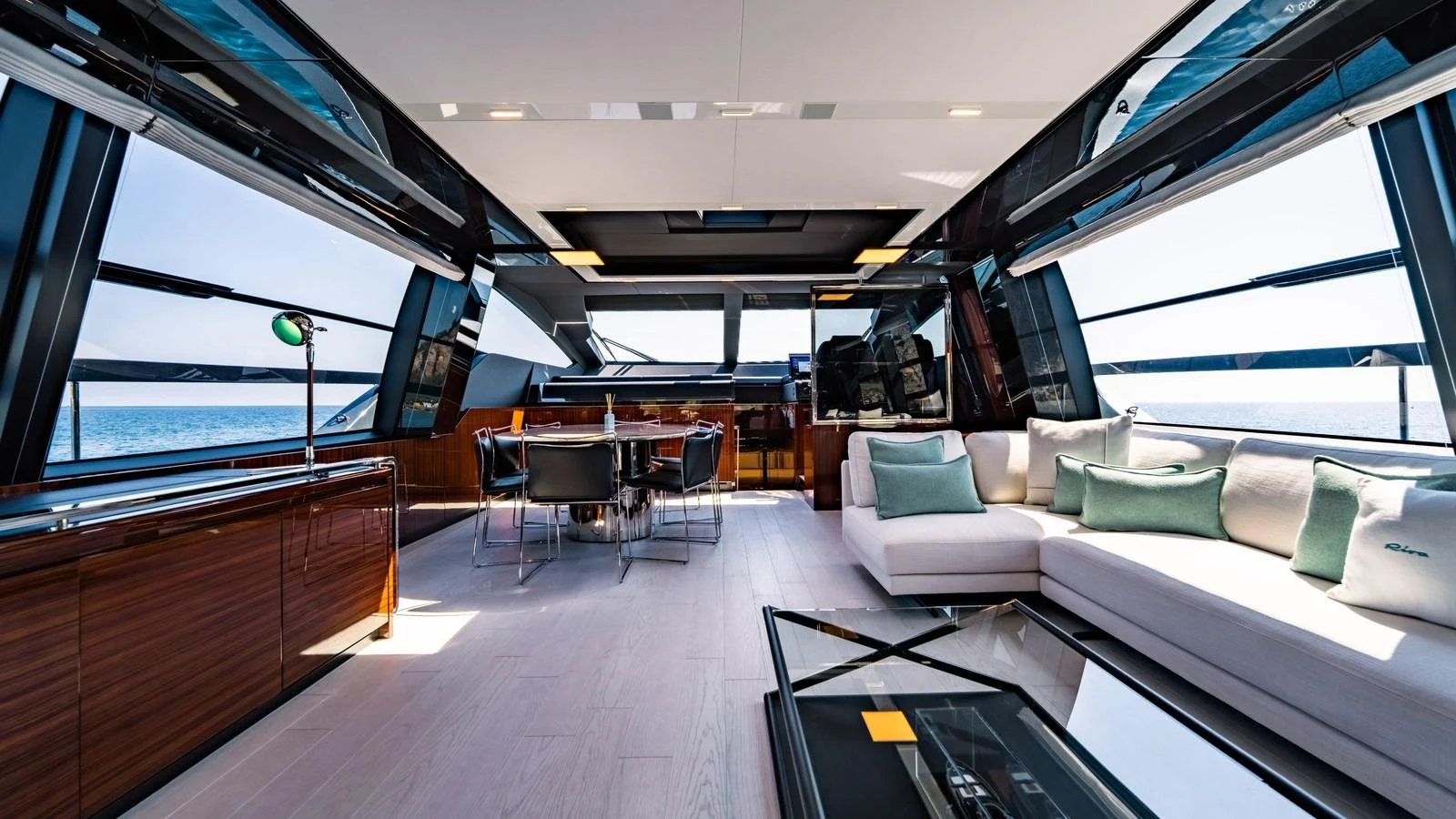 The salon offers a spacious and luxurious seating area with panoramic views. aboard MAYAR Yacht for Sale