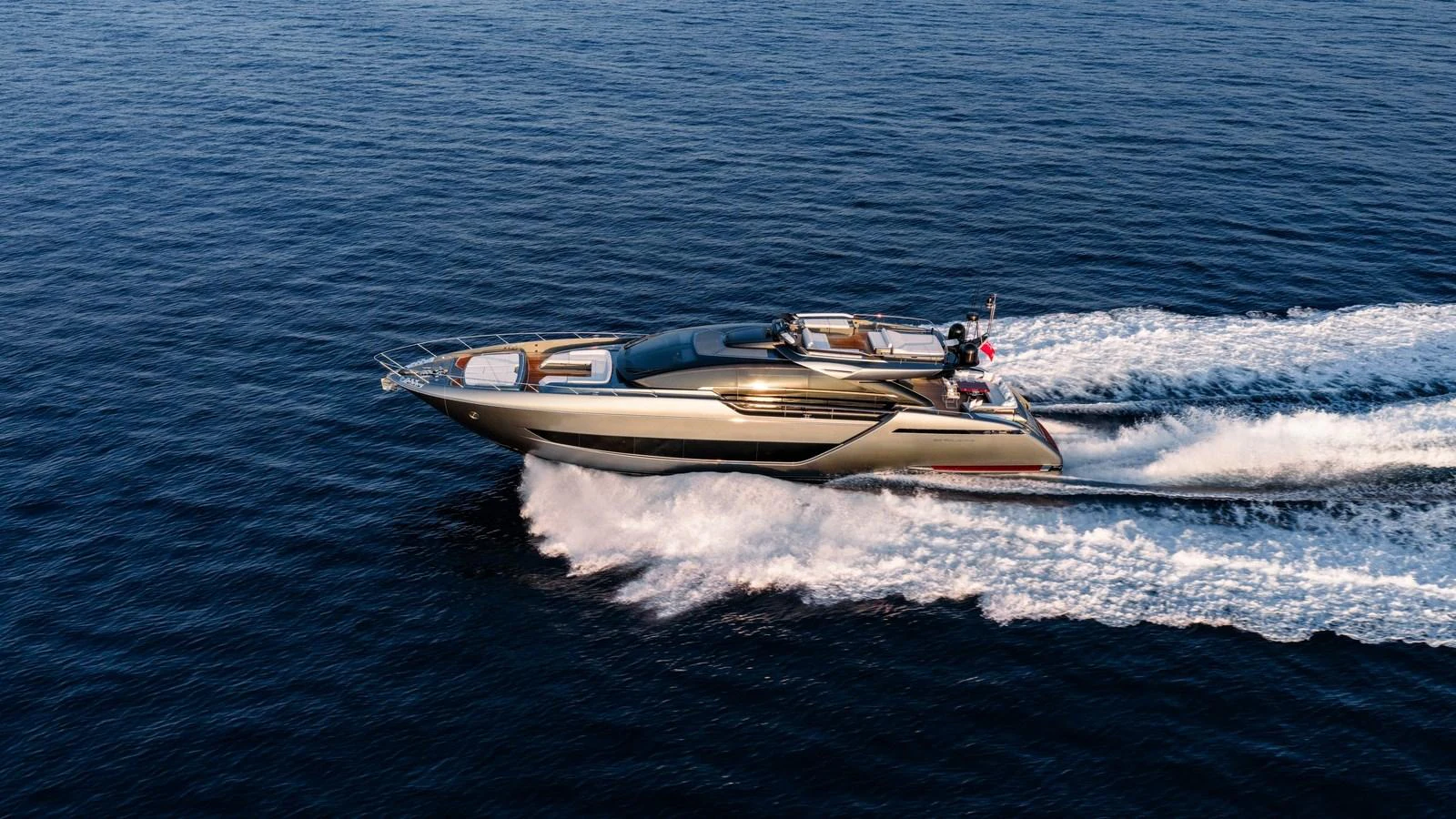 A sleek yacht cruises swiftly over the open water, showcasing its modern design and powerful performance. aboard MAYAR Yacht for Sale