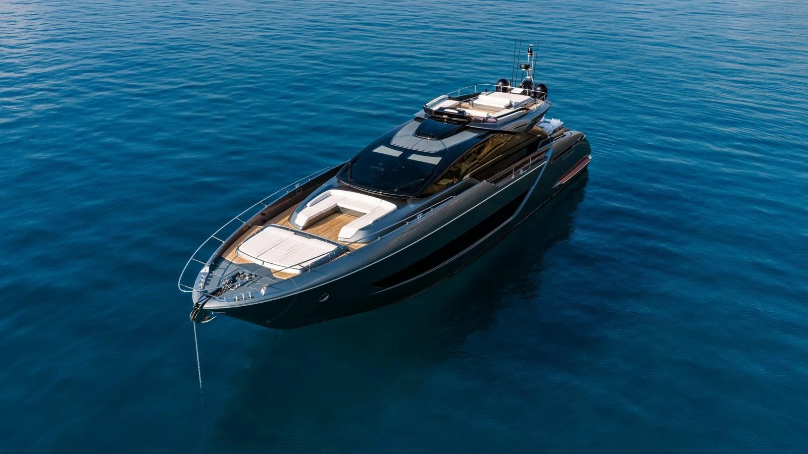 A sleek and modern yacht glides gracefully on calm blue waters. aboard MAYAR Yacht for Sale