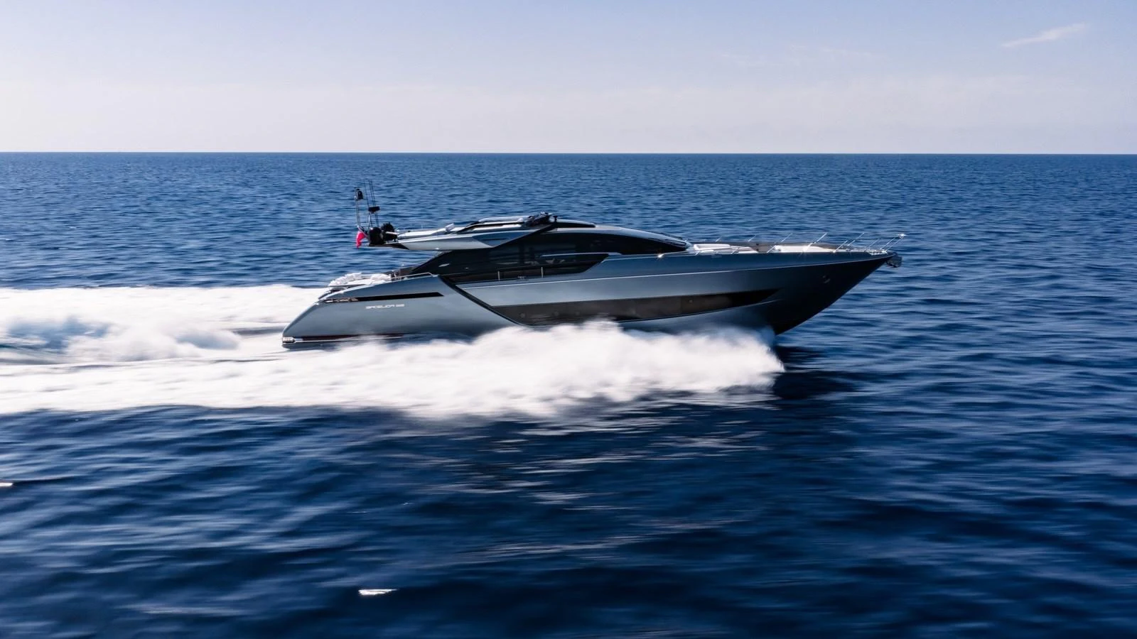 A sleek and modern yacht cruises swiftly across the open sea. aboard MAYAR Yacht for Sale