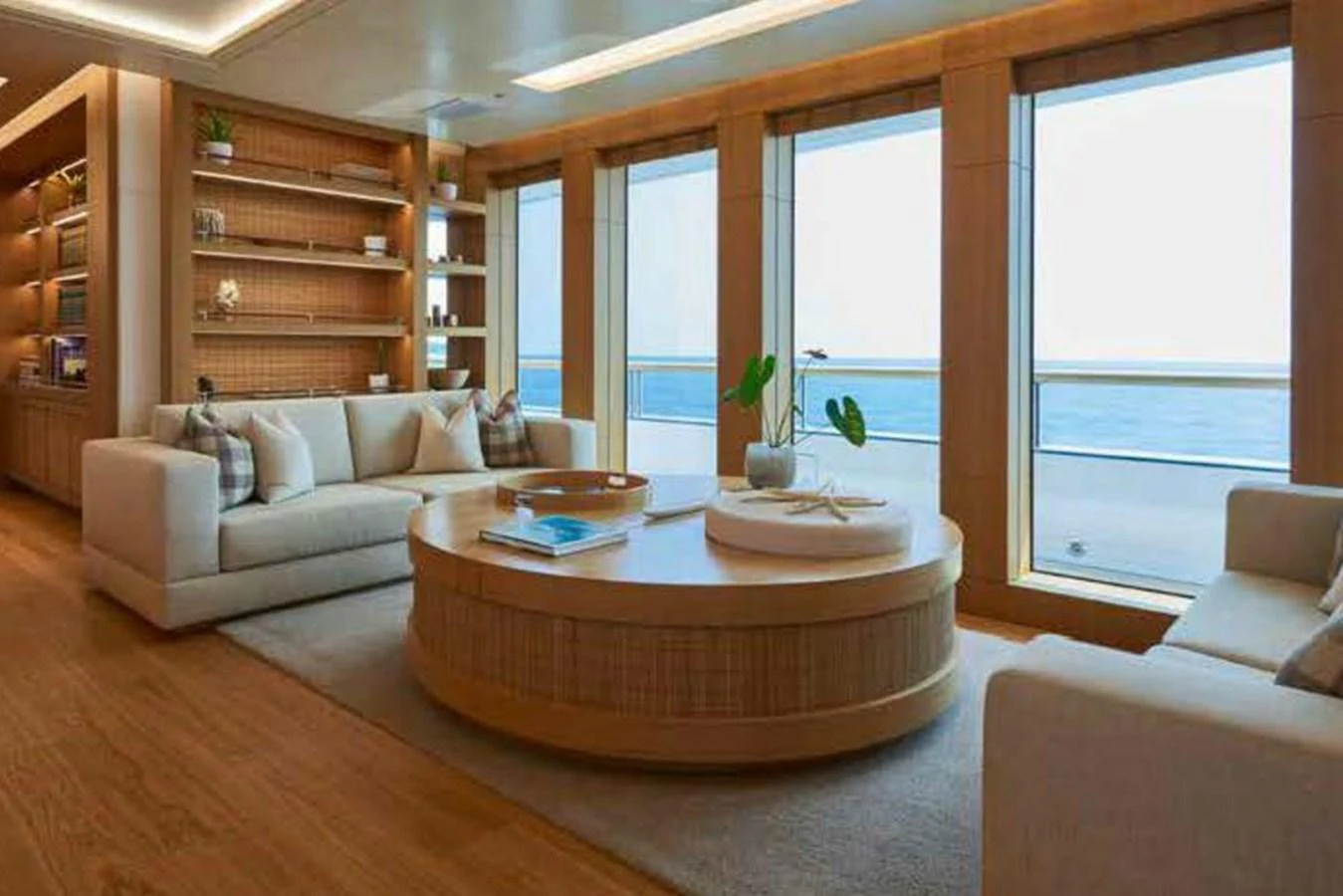 The salon features elegant furnishings and large windows offering stunning ocean views. aboard DYTAN Yacht for Sale