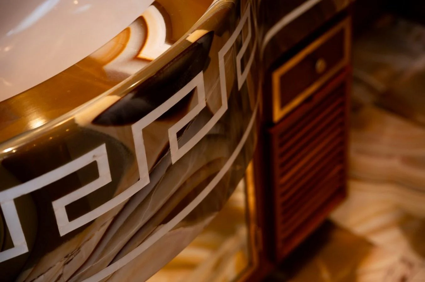 A close-up of a luxurious yacht interior detail featuring intricate design elements. aboard STELLA FIERA II Yacht for Sale