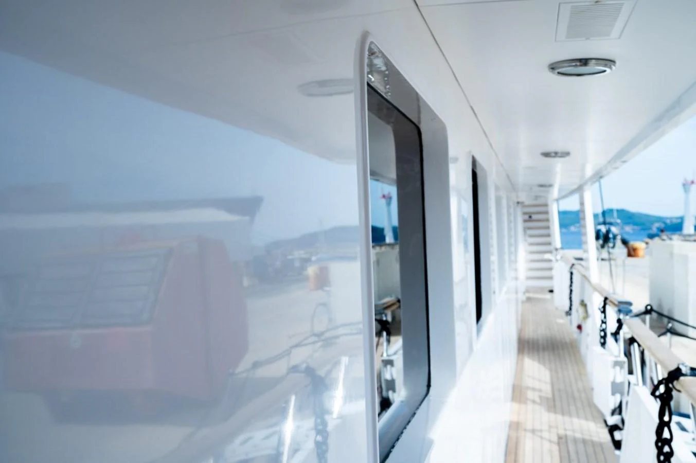 The yacht's side deck features sleek, modern lines and ample space for easy movement. aboard STELLA FIERA II Yacht for Sale