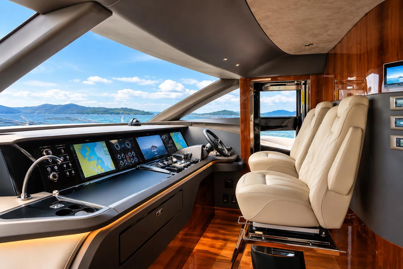 The helm station offers a sophisticated and modern control area with panoramic views. aboard MOONFLOWER Yacht for Sale