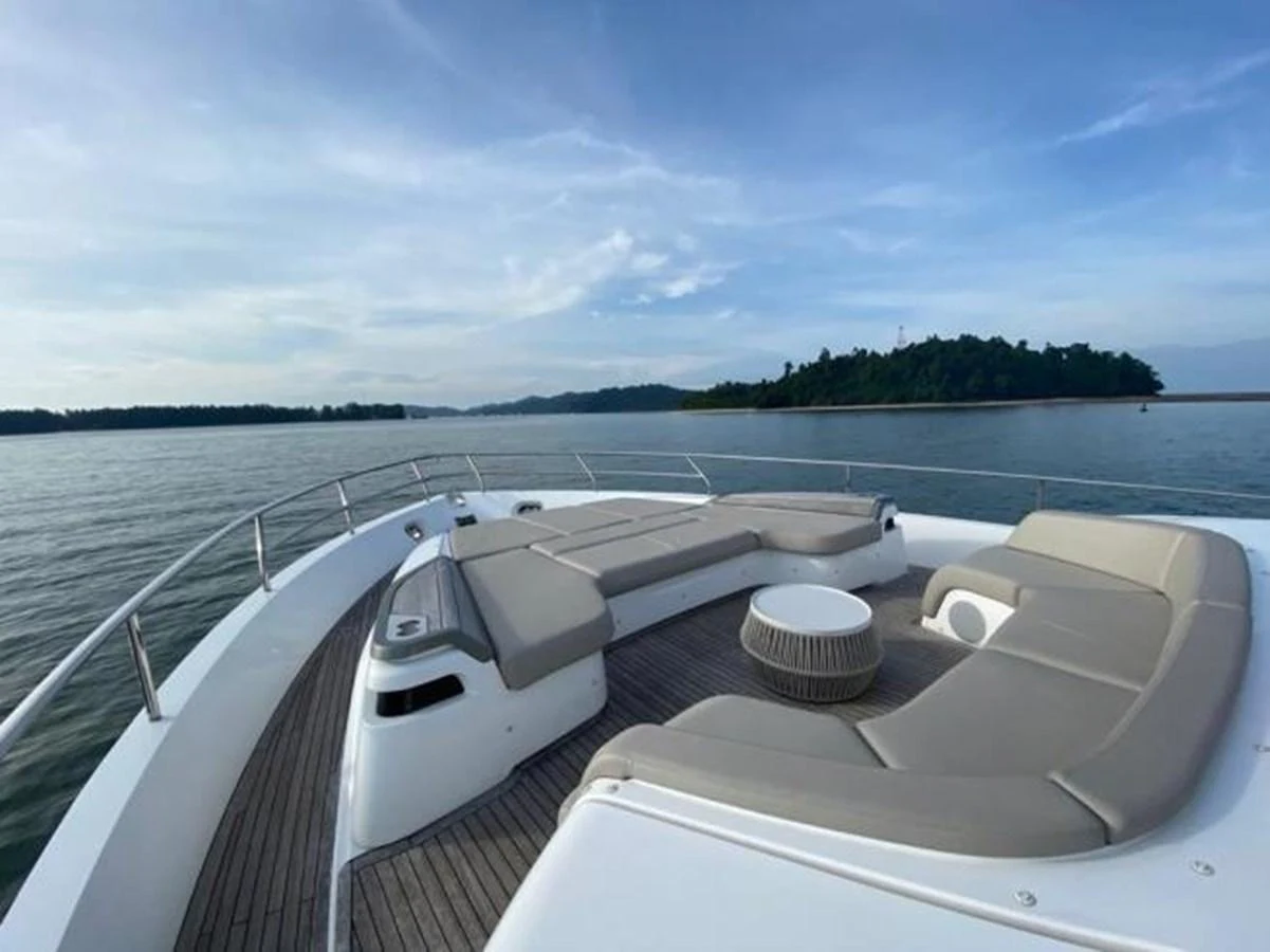 The bow of the yacht features a spacious lounging area with comfortable seating and scenic views. aboard MOONFLOWER Yacht for Sale