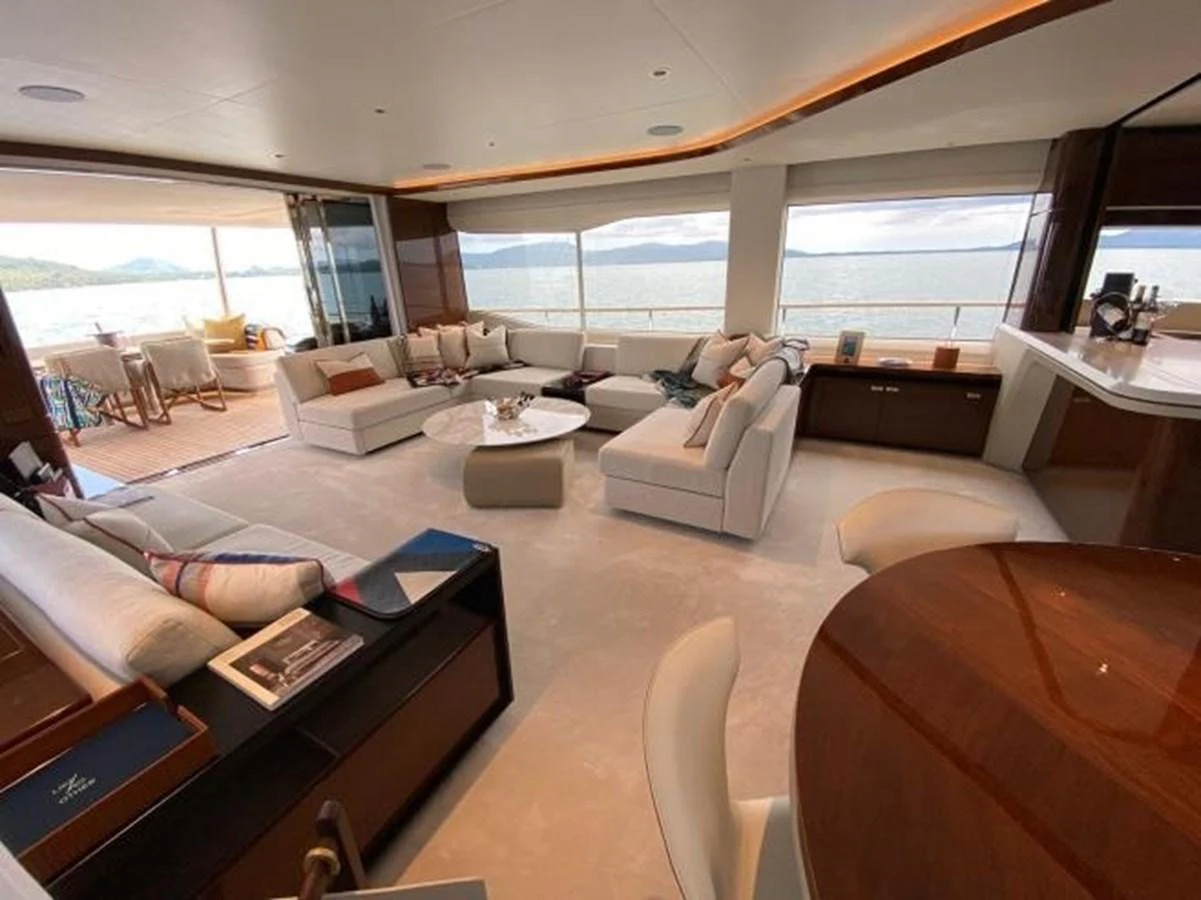 The spacious salon offers luxurious seating with panoramic views of the sea. aboard MOONFLOWER Yacht for Sale