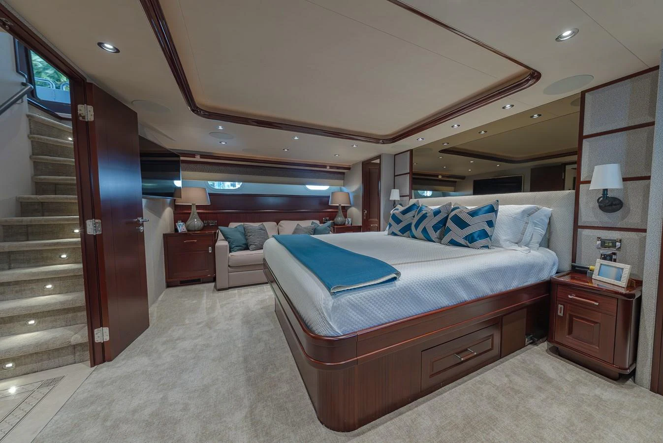 The master stateroom features a luxurious bed with elegant bedding and ample space for relaxation. aboard DETERMINATION Yacht for Sale