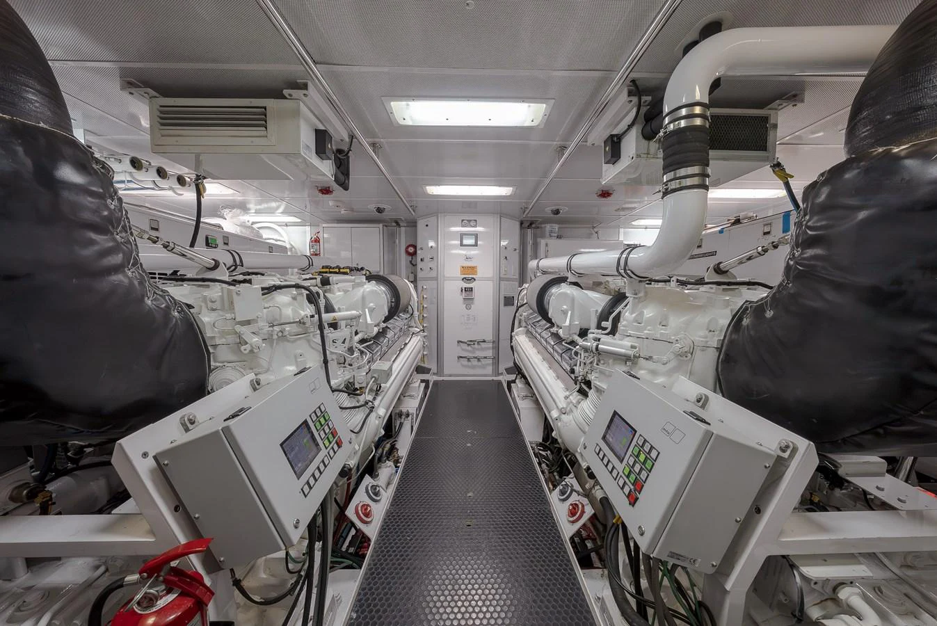 The engine room showcases the yacht's powerful and meticulously maintained machinery. aboard DETERMINATION Yacht for Sale