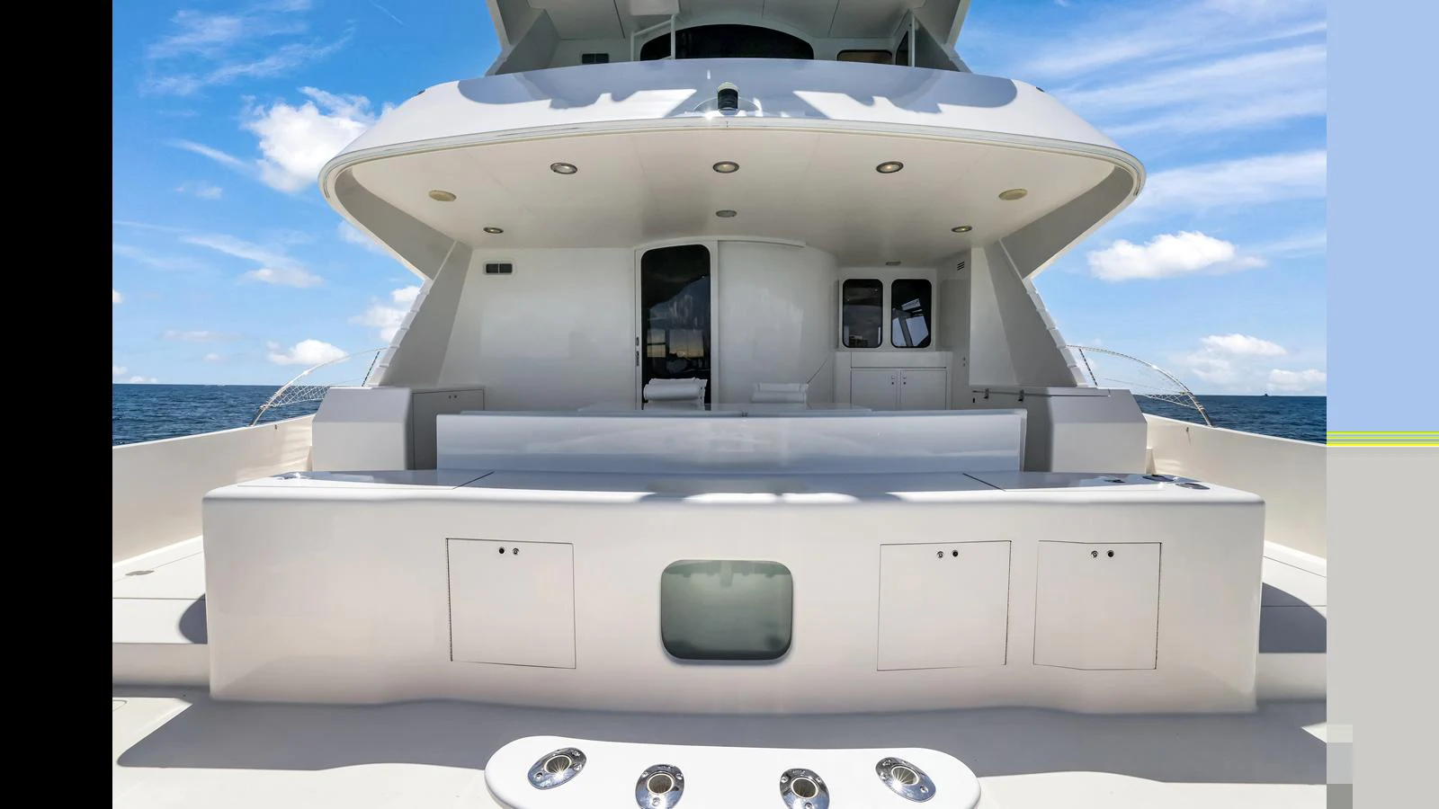 The yacht's aft deck offers a spacious and inviting area for relaxation and entertainment. aboard MOANA Yacht for Sale