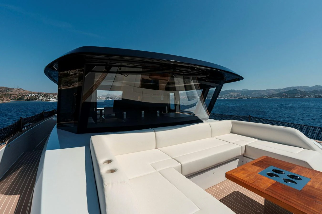 The yacht's flybridge offers a spacious and luxurious seating area with a stunning view of the surrounding waters. aboard LUCKY LUKA Yacht for Sale