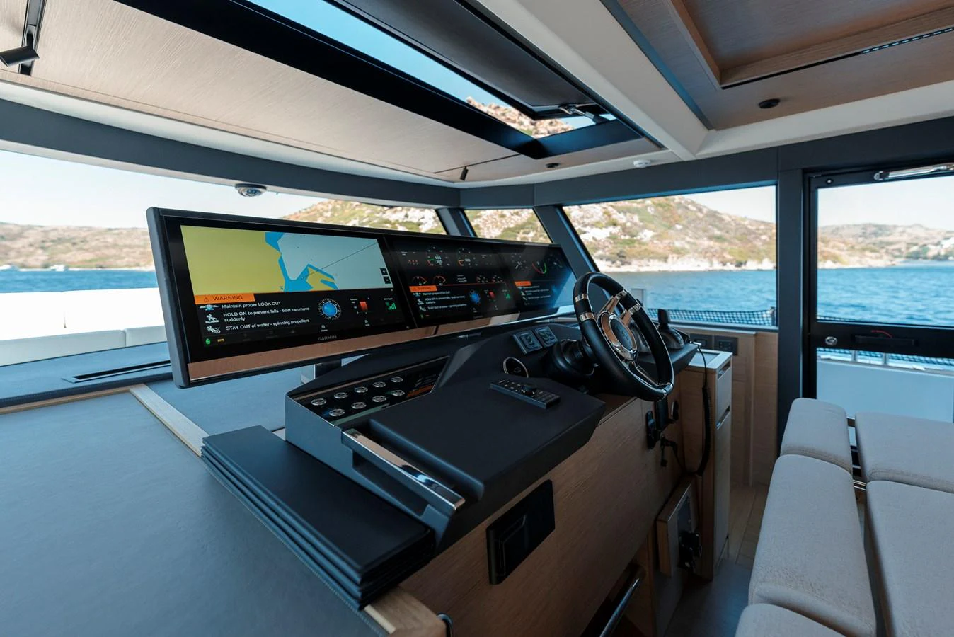 The helm station offers a modern and sleek design with advanced navigation systems and panoramic views. aboard LUCKY LUKA Yacht for Sale