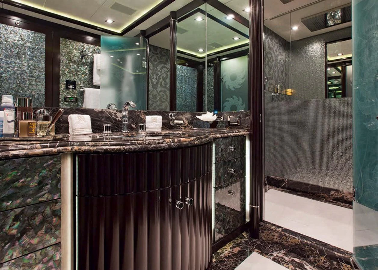 The yacht's bathroom features luxurious marble surfaces and modern fixtures. aboard RUSH Yacht for Sale