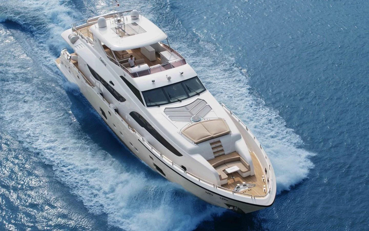 A luxurious yacht cruises through the open sea, showcasing its sleek design and spacious decks. aboard HEYSEA ASTERIA 126/1 Yacht for Sale