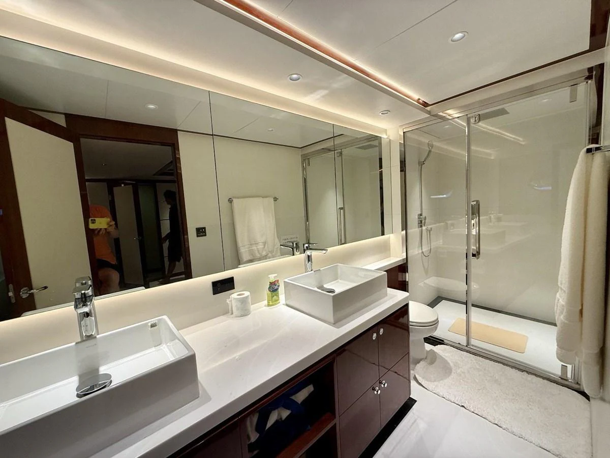 The yacht's bathroom features modern fixtures and a spacious shower area. aboard HEYSEA ASTERIA 126/1 Yacht for Sale