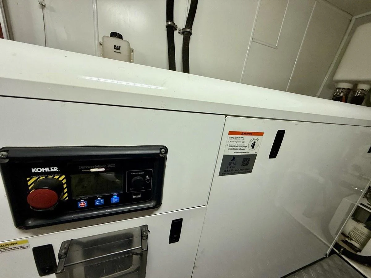 The image showcases a close-up of the yacht's generator system, highlighting its technical components. aboard HEYSEA ASTERIA 126/1 Yacht for Sale