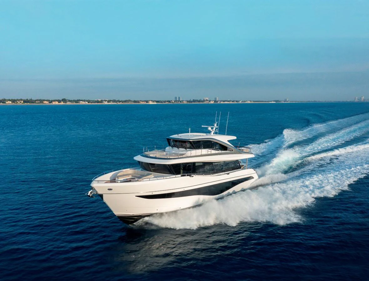 A sleek yacht cruises swiftly across the open sea, showcasing its modern design and powerful performance. aboard PRINCESS X80 Yacht for Sale