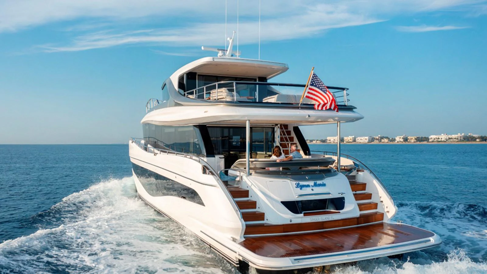 A luxurious yacht cruises through the open water, showcasing its sleek design and spacious aft deck. aboard PRINCESS X80 Yacht for Sale