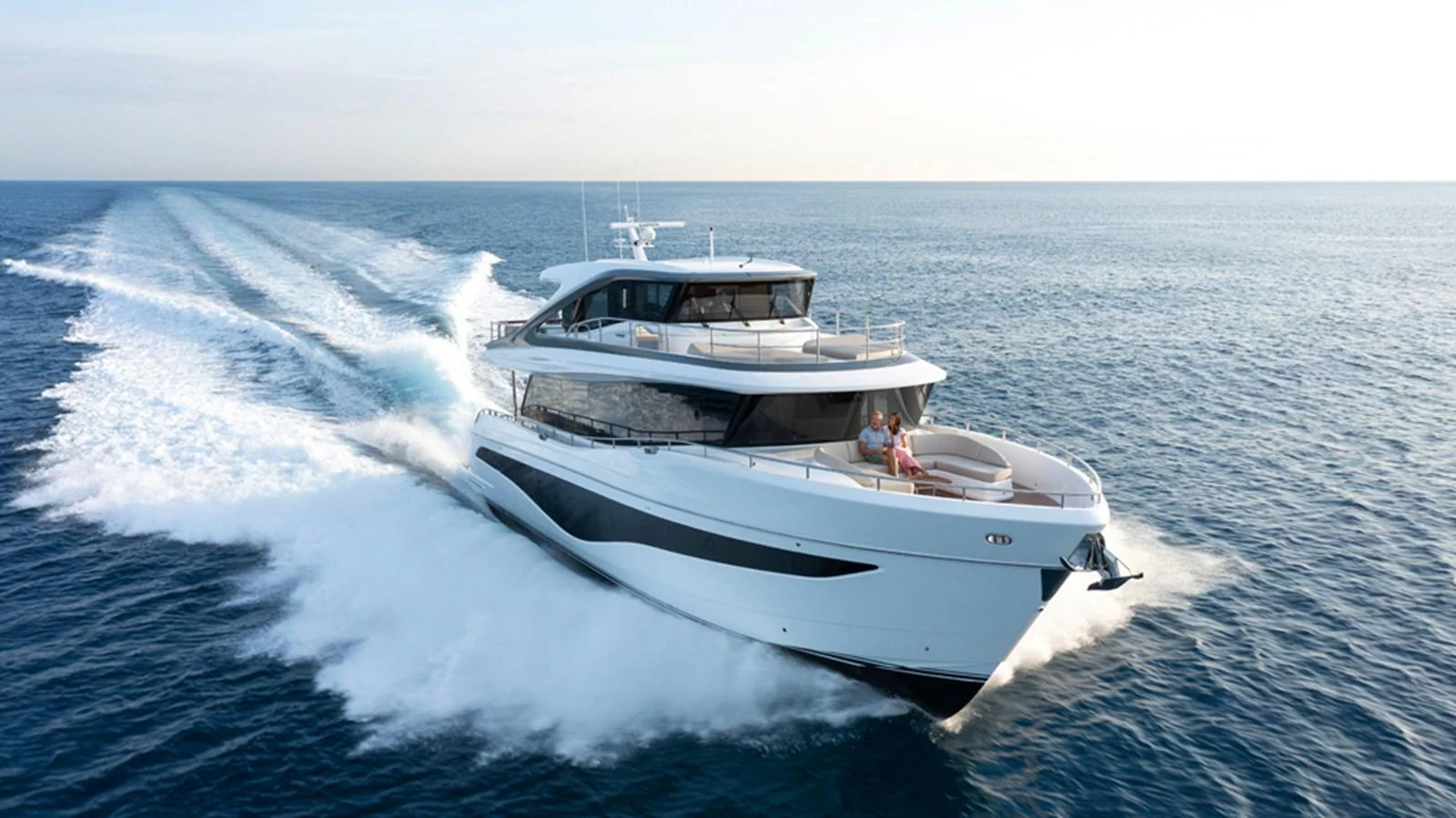 A sleek and modern yacht cruises swiftly through the open sea, showcasing its elegant design and powerful performance. aboard PRINCESS X80 Yacht for Sale