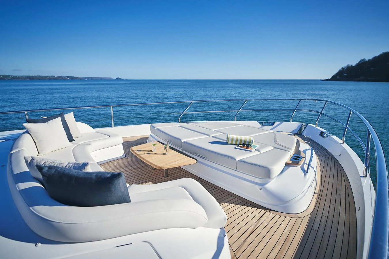 The sundeck offers luxurious lounging with plush seating and stunning ocean views. aboard PRINCESS Y72 Yacht for Sale