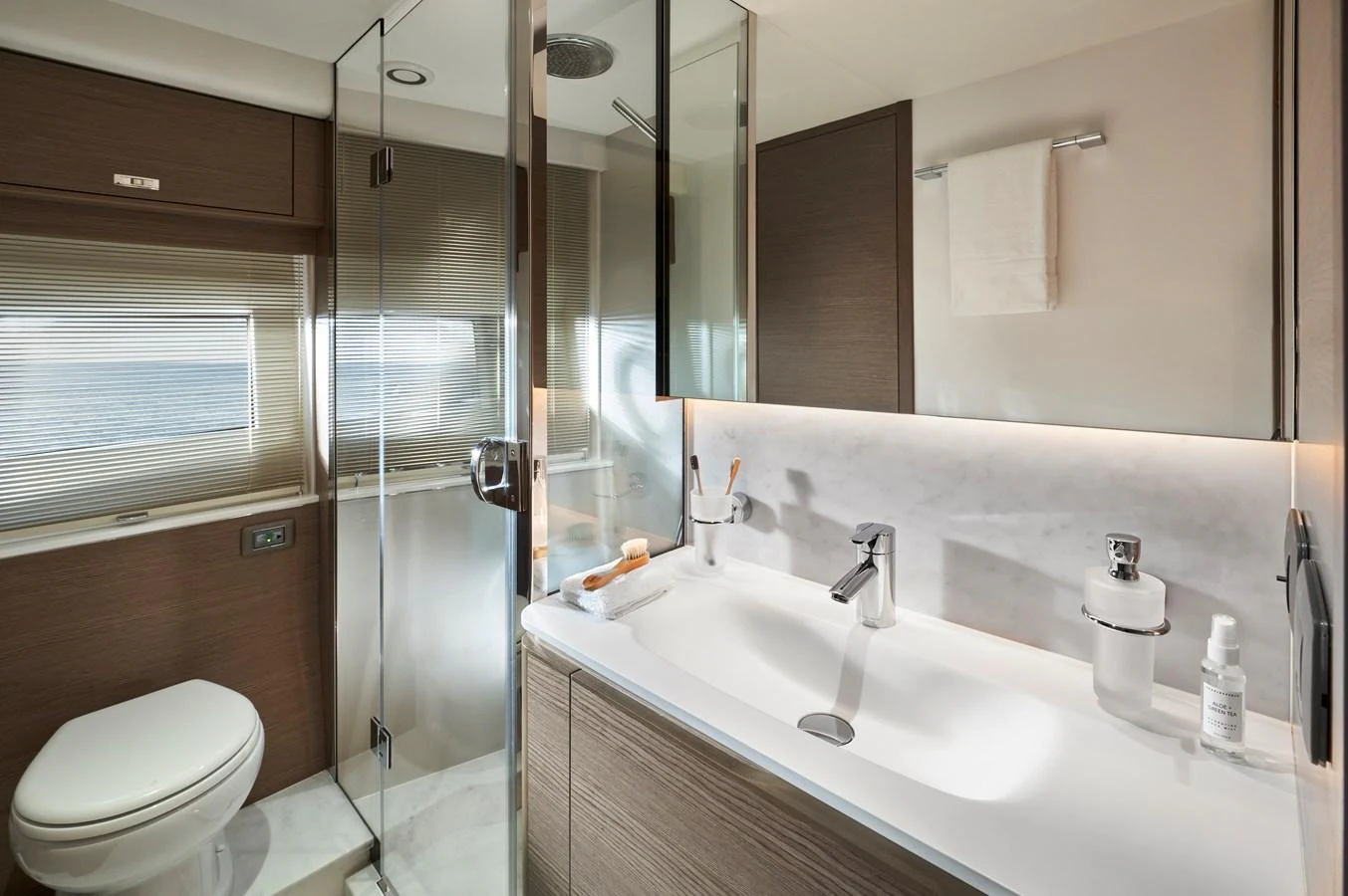 The yacht's bathroom features modern fixtures and a sleek design. aboard PRINCESS Y72 Yacht for Sale