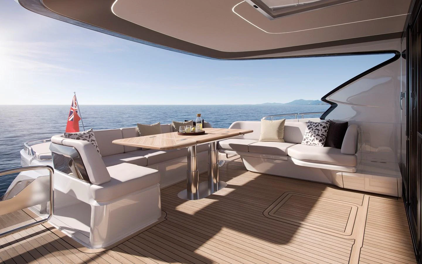 The aft deck offers a luxurious outdoor seating area with a dining table, perfect for enjoying meals with a view of the sea. aboard PRINCESS S74 Yacht for Sale