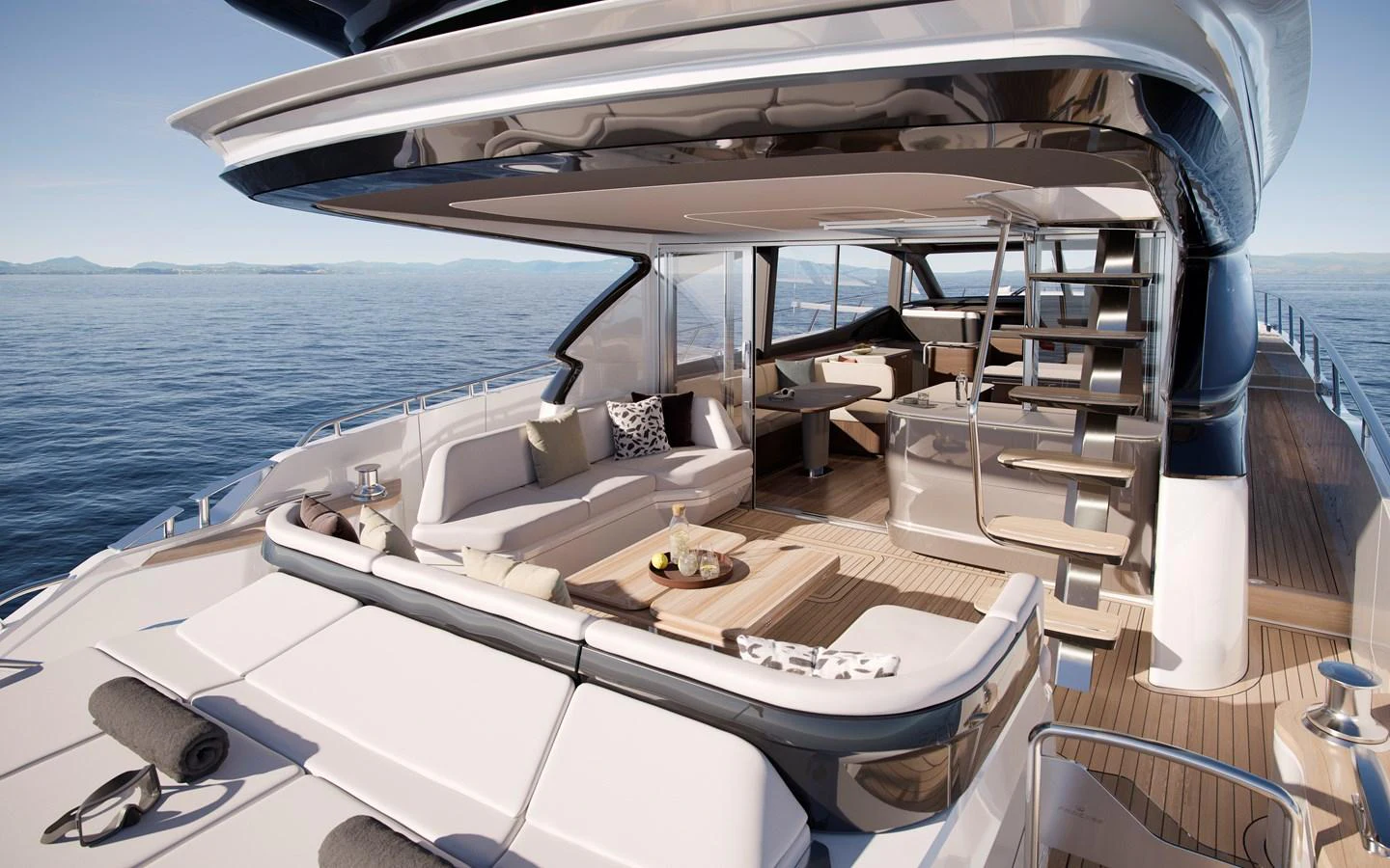 The aft deck offers a luxurious outdoor seating area with stunning ocean views. aboard PRINCESS S74 Yacht for Sale