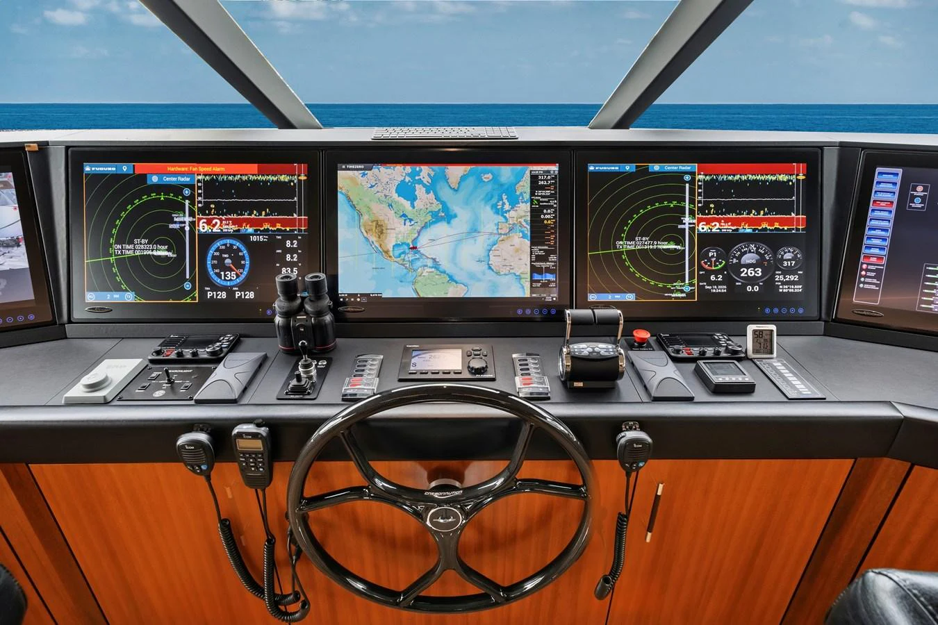 The helm station features advanced navigation equipment and a panoramic view of the sea. aboard SEAS THE DAY Yacht for Sale