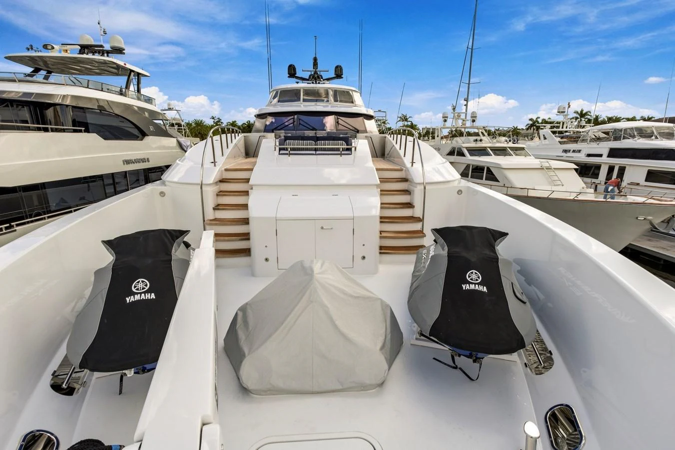 The foredeck features a spacious layout with covered seating and sunbathing areas. aboard SEAS THE DAY Yacht for Sale