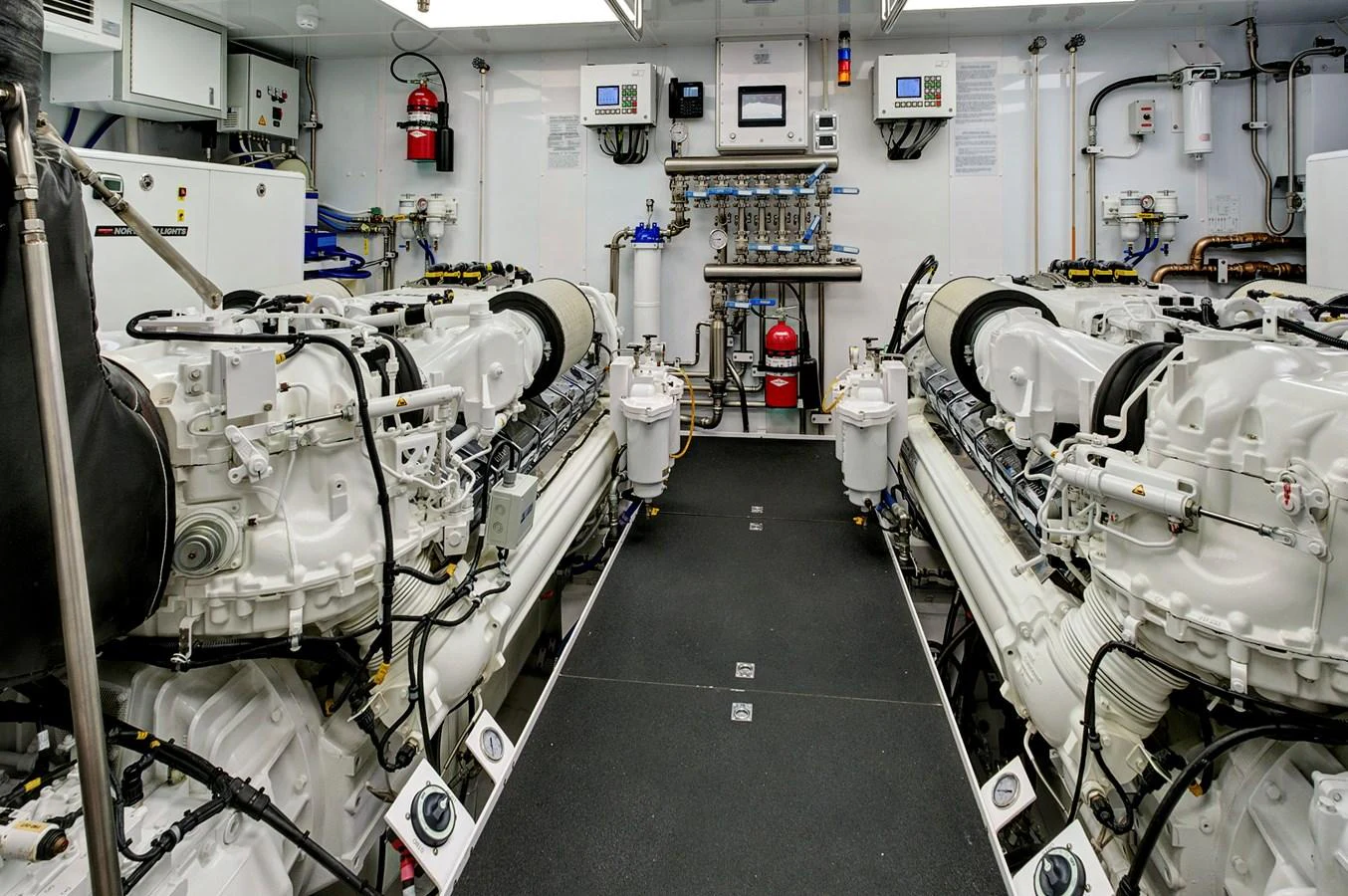 The engine room showcases powerful machinery and advanced engineering. aboard SEAS THE DAY Yacht for Sale