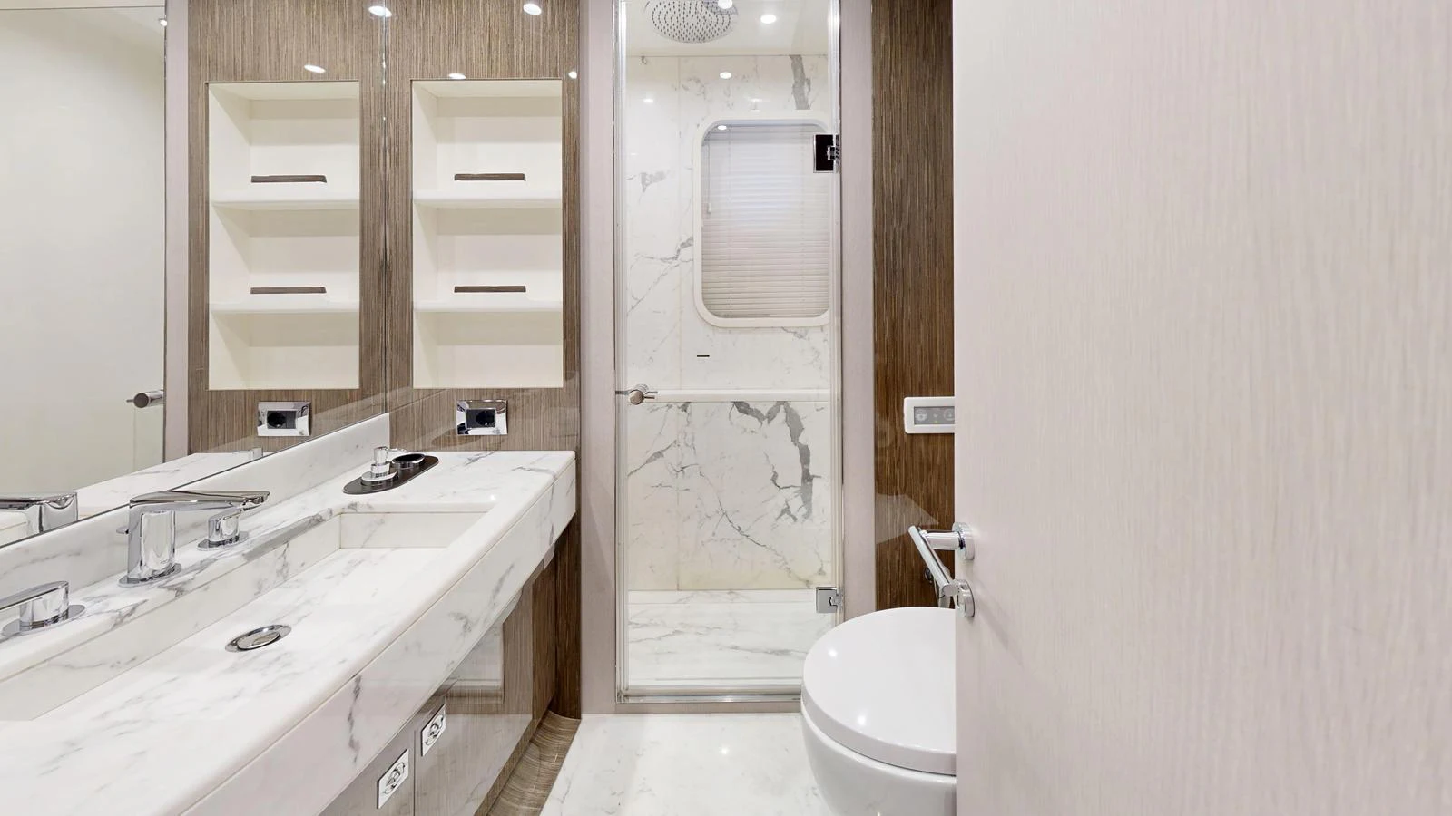 The yacht's bathroom features elegant marble surfaces and modern fixtures. aboard 98.92' AZIMUT GRANDE Yacht for Sale