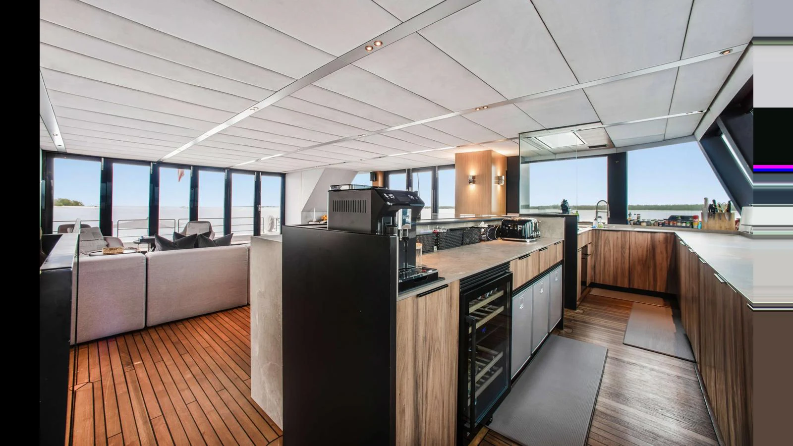 The yacht's galley features modern appliances and a spacious layout with ample natural light. aboard MIDORI Yacht for Sale