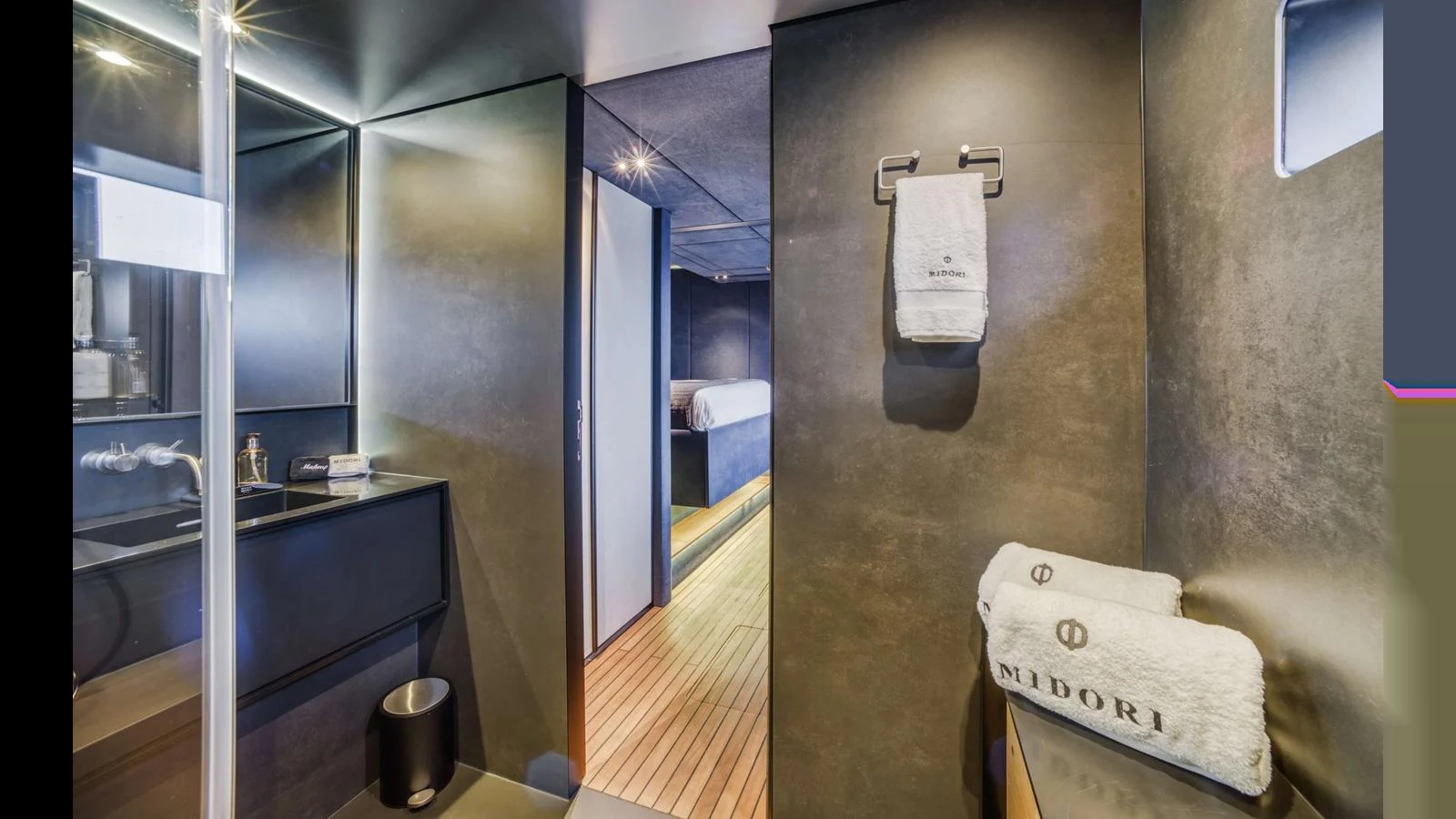 The yacht's bathroom features modern fixtures and a sleek design. aboard MIDORI Yacht for Sale