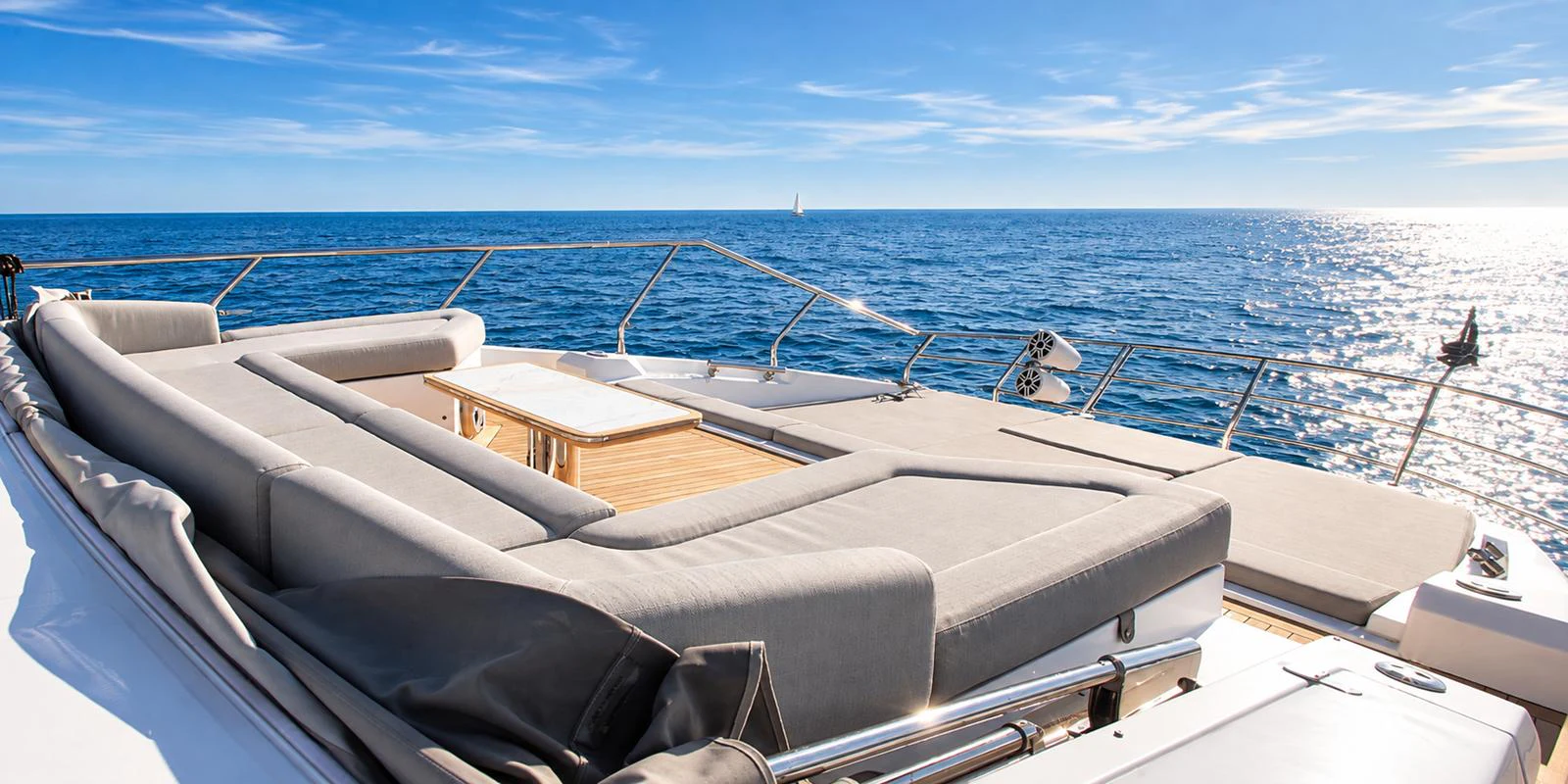 The sundeck offers luxurious lounging with panoramic ocean views. aboard ESCAPE Yacht for Sale