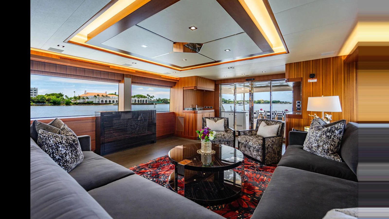 The salon offers a luxurious and spacious area with plush seating and panoramic views. aboard TRU LUV Yacht for Sale