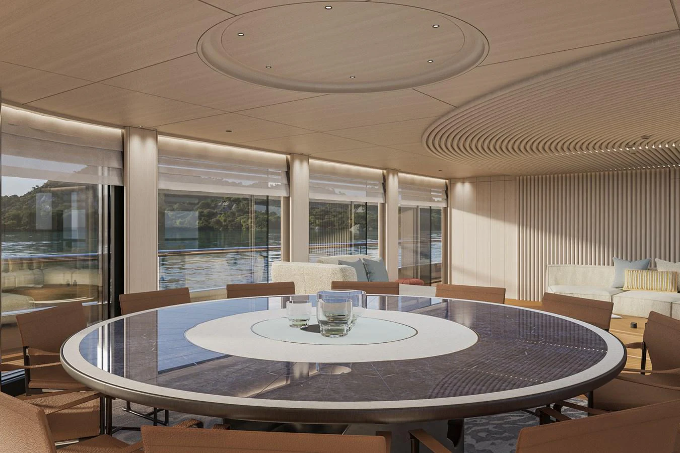 The yacht's dining area features a large round table with panoramic views through expansive windows. aboard ARCANE ERA AND NOVA Yacht for Sale