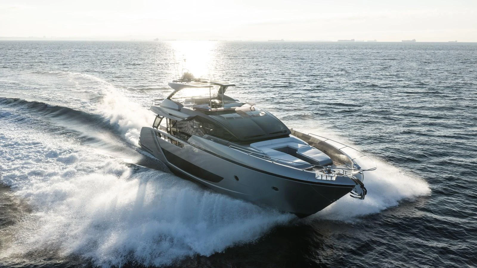 A sleek and modern yacht cruises swiftly through the open water, showcasing its powerful design. aboard CREA Yacht for Sale