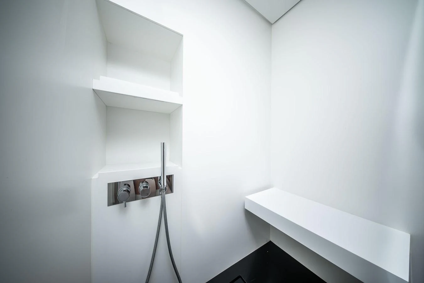 A sleek and modern yacht bathroom with minimalist design and clean lines. aboard CREA Yacht for Sale