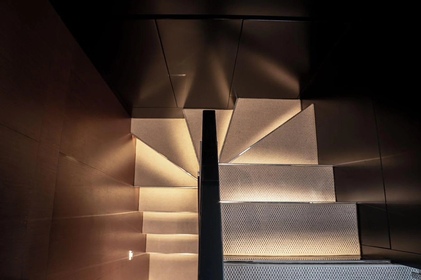 A modern staircase with sleek lighting and contemporary design. aboard CREA Yacht for Sale