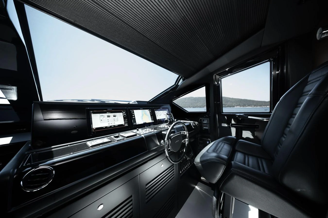 The sleek and modern helm station offers advanced navigation technology and luxurious seating. aboard CREA Yacht for Sale