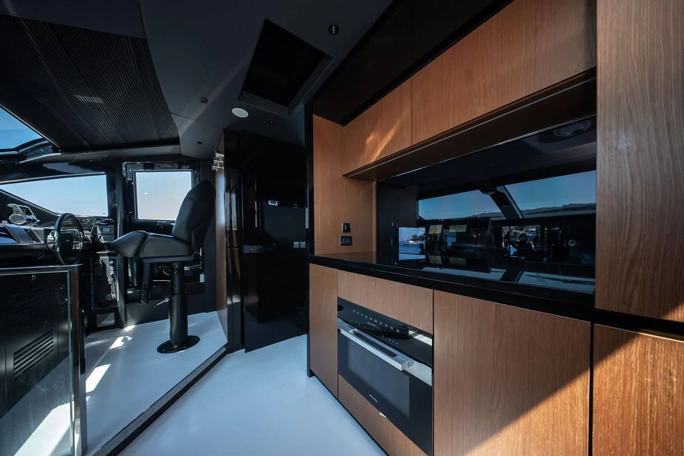 The yacht's galley features modern appliances and sleek cabinetry, offering a stylish and functional space for culinary activities. aboard CREA Yacht for Sale