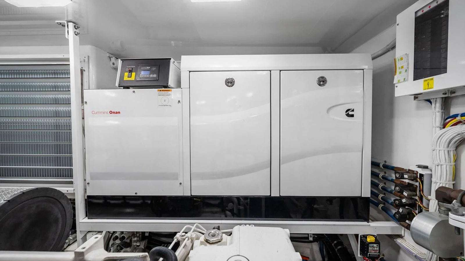The image showcases the clean and well-organized engine room of the yacht, featuring modern equipment. aboard DOUBLE BARREL Yacht for Sale